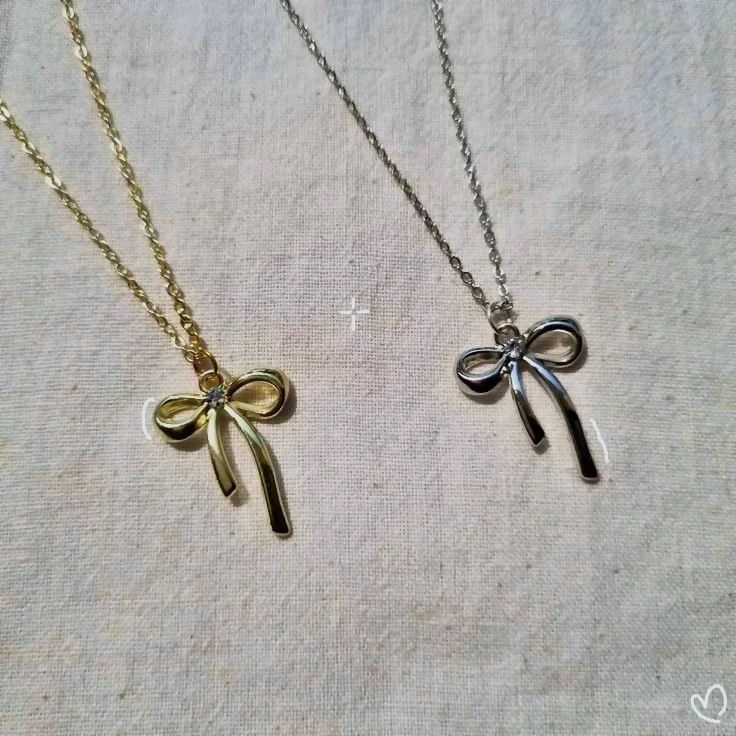 Collier nœud doré et argenté