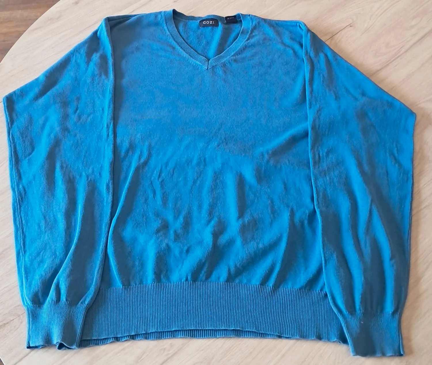 Pull IZOD col en V coton uni finitions côtelées bleu Homme taille L