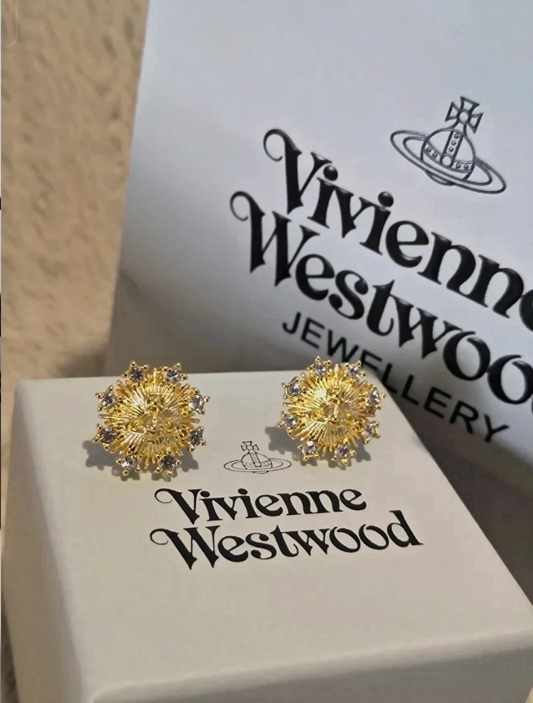 Boucles d'oreilles Vivienne Westwood dorées strass