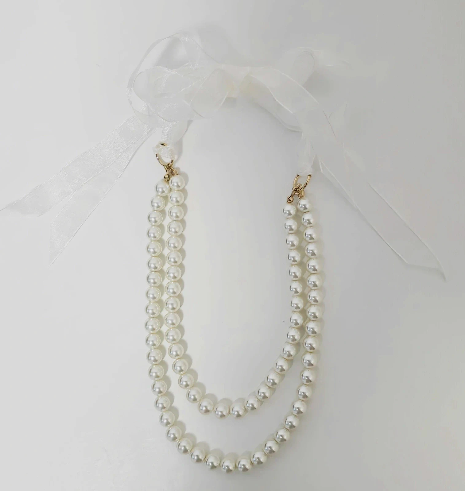 Collar de perlas doble con lazo