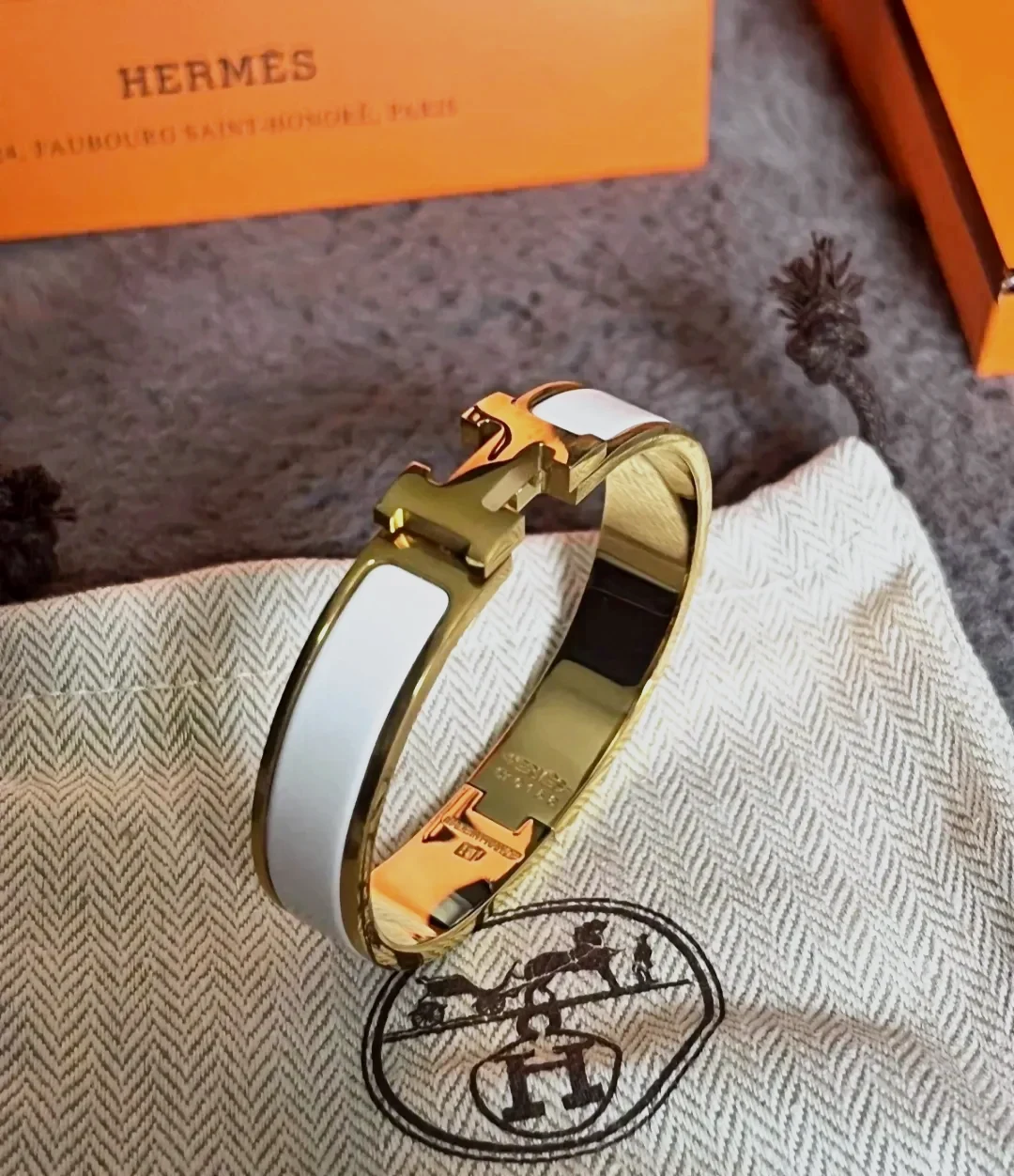 Bracelet Hermès Clic H émail blanc orange