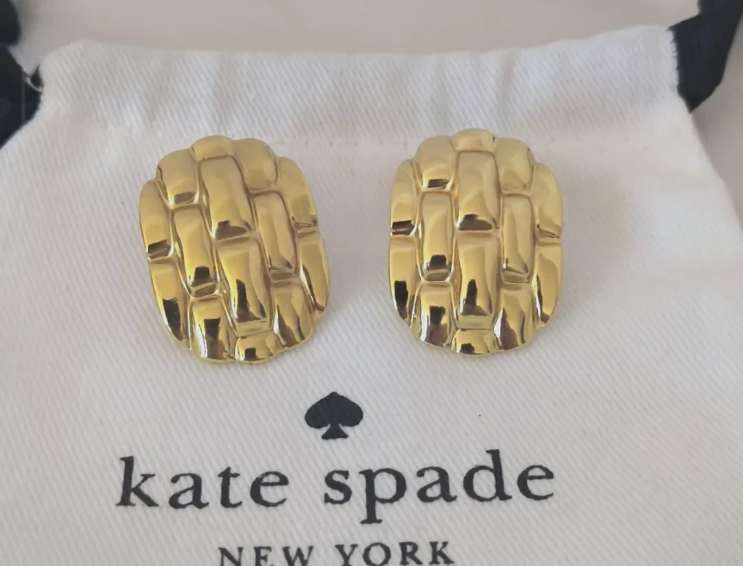 Boucles d'oreilles Kate Spade dorées effet tressé