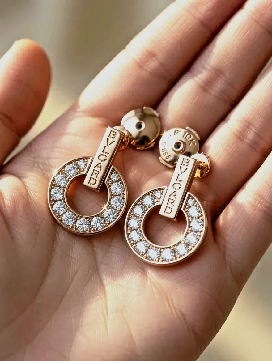 Boucles d'oreilles Bvlgard dorées cristaux