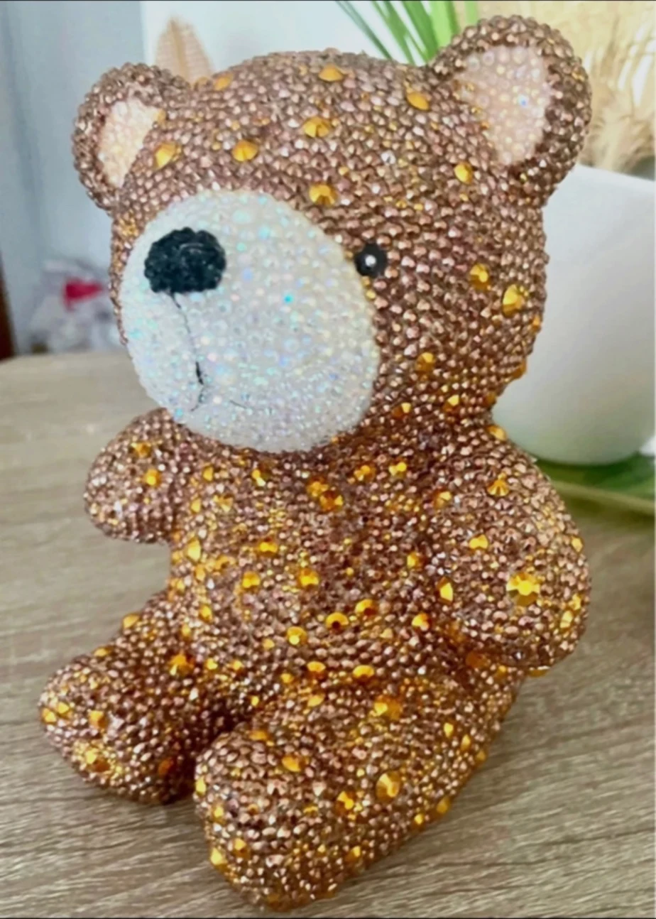 Tirelire ourson décorative en strass dorés