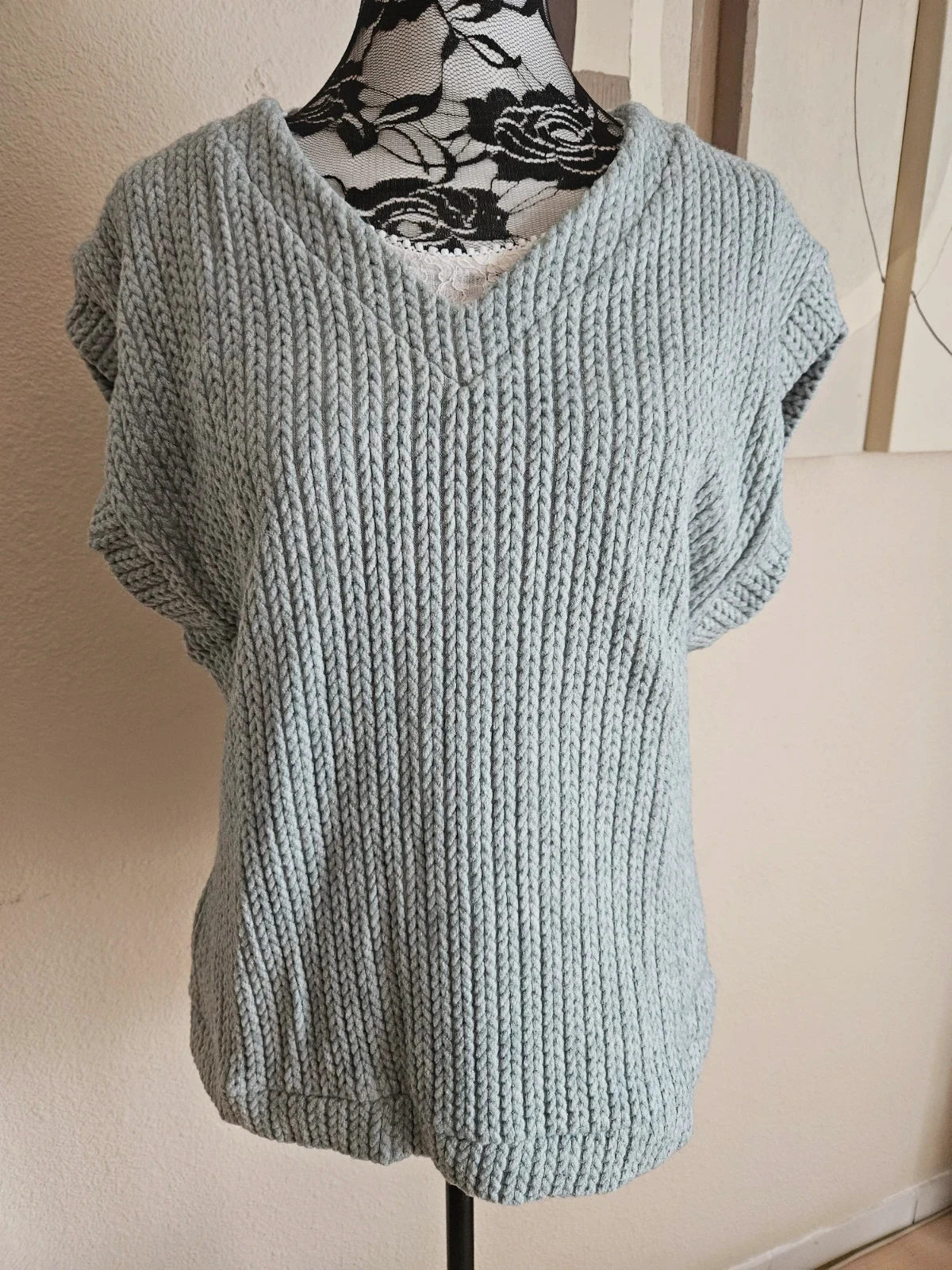 Joli haut en mailles sans manches taille 42/44