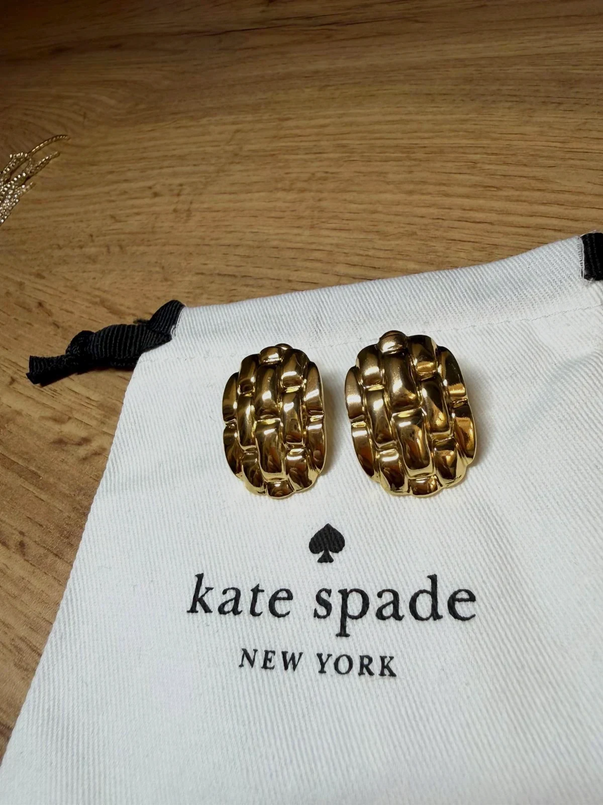 Boucles d'oreilles Kate Spade dorées tressées