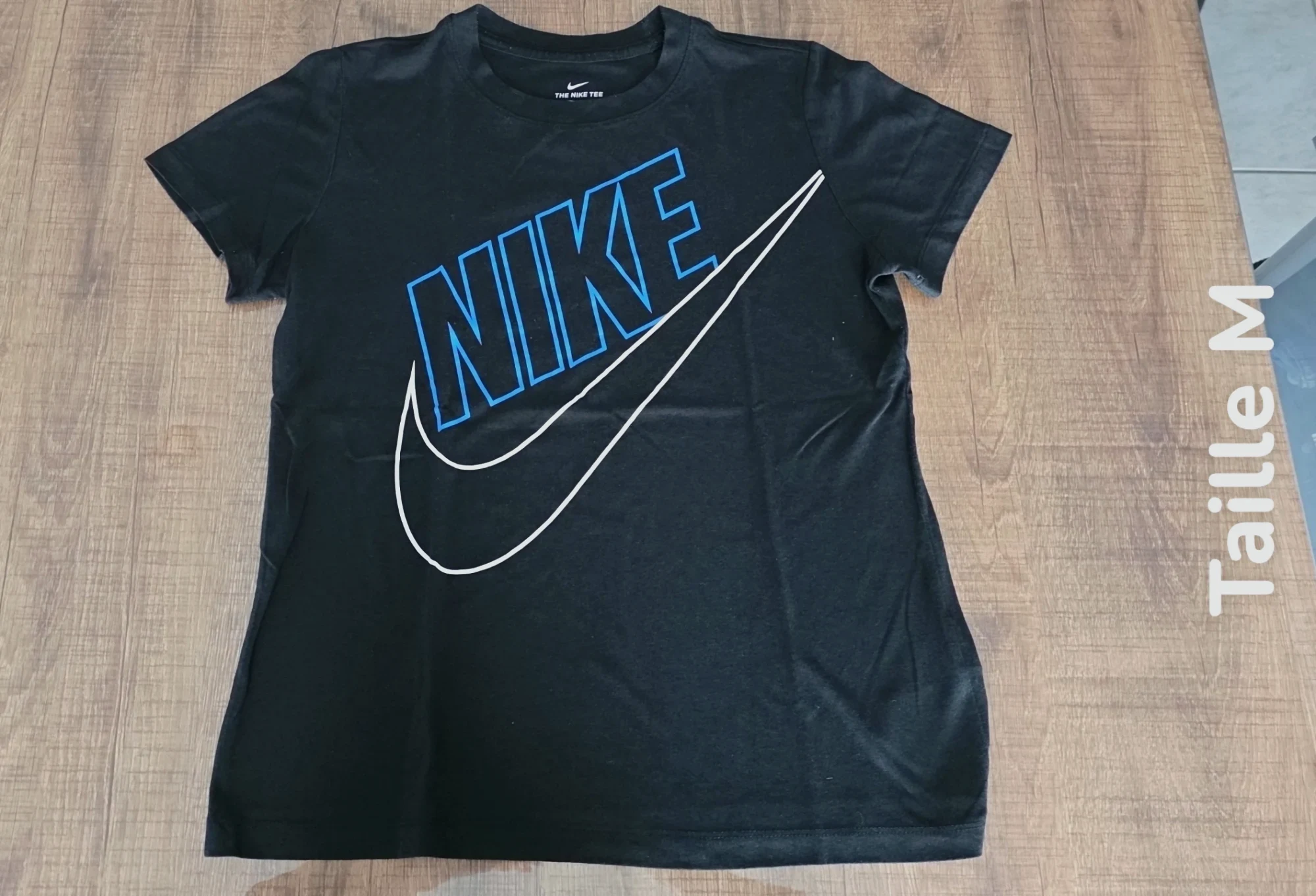 T-shirt noir Nike logo bleu Taille M