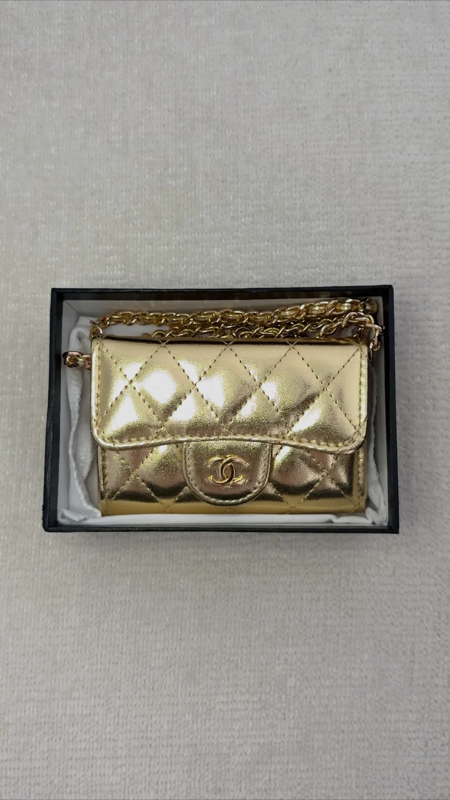 Pochette mini sac Chanel doré matelassé