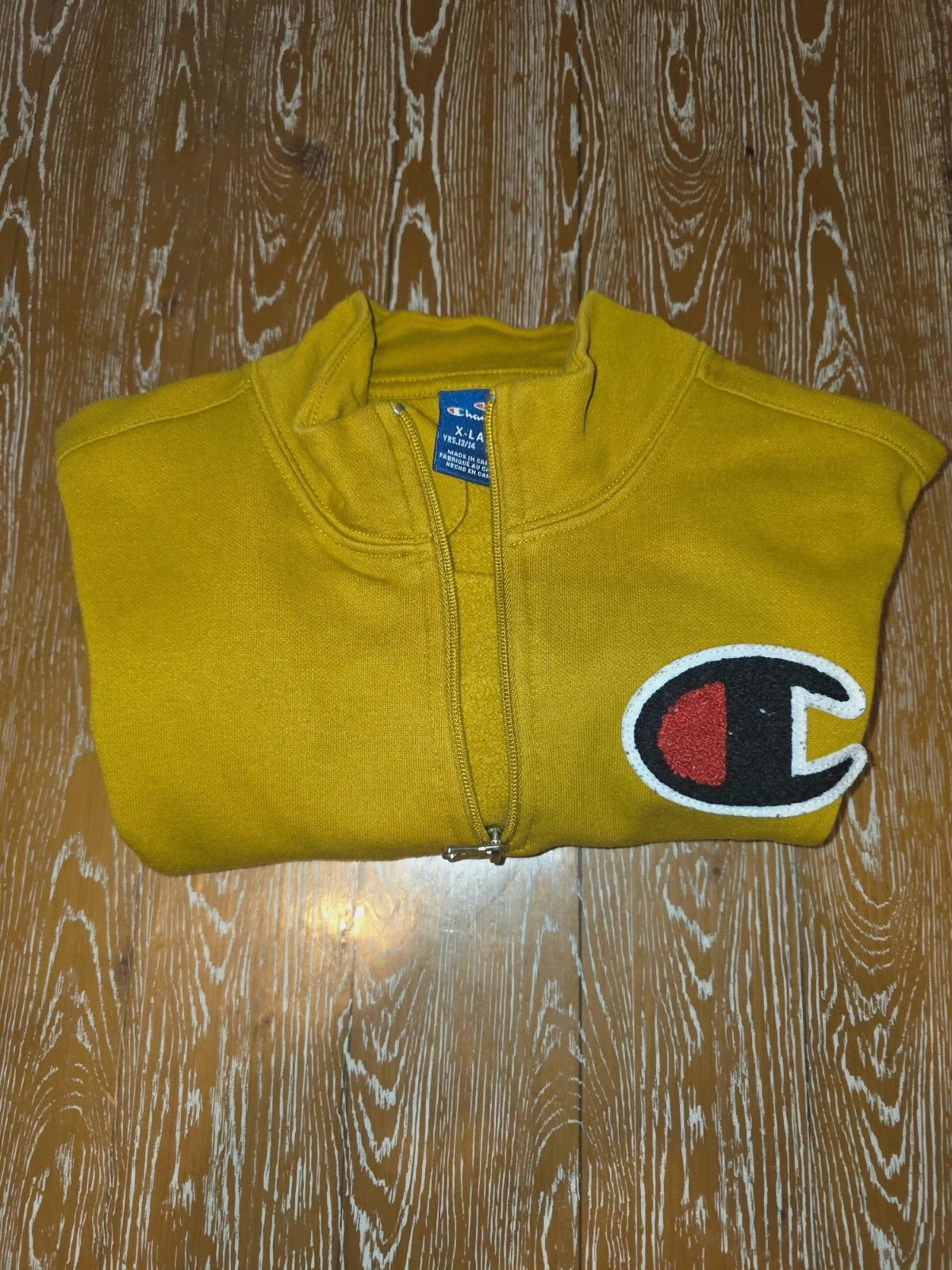 Pull molletonné Champion à col zippé jaune moutarde