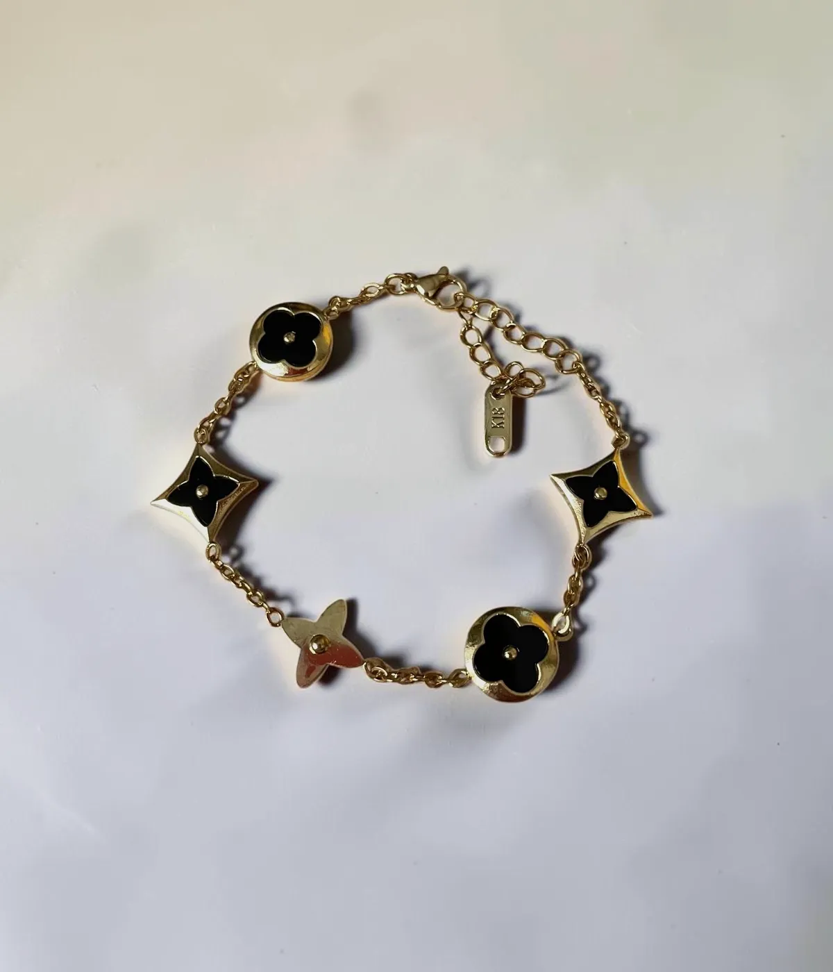 Bracelet chaîne or noir fleurs – ASOS – or noir 2