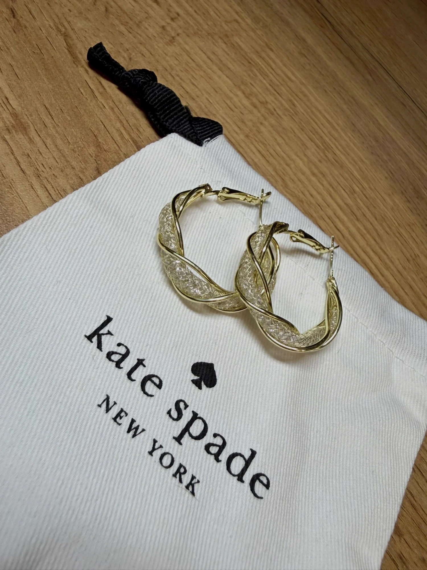Boucles d'oreilles Kate Spade tressées
