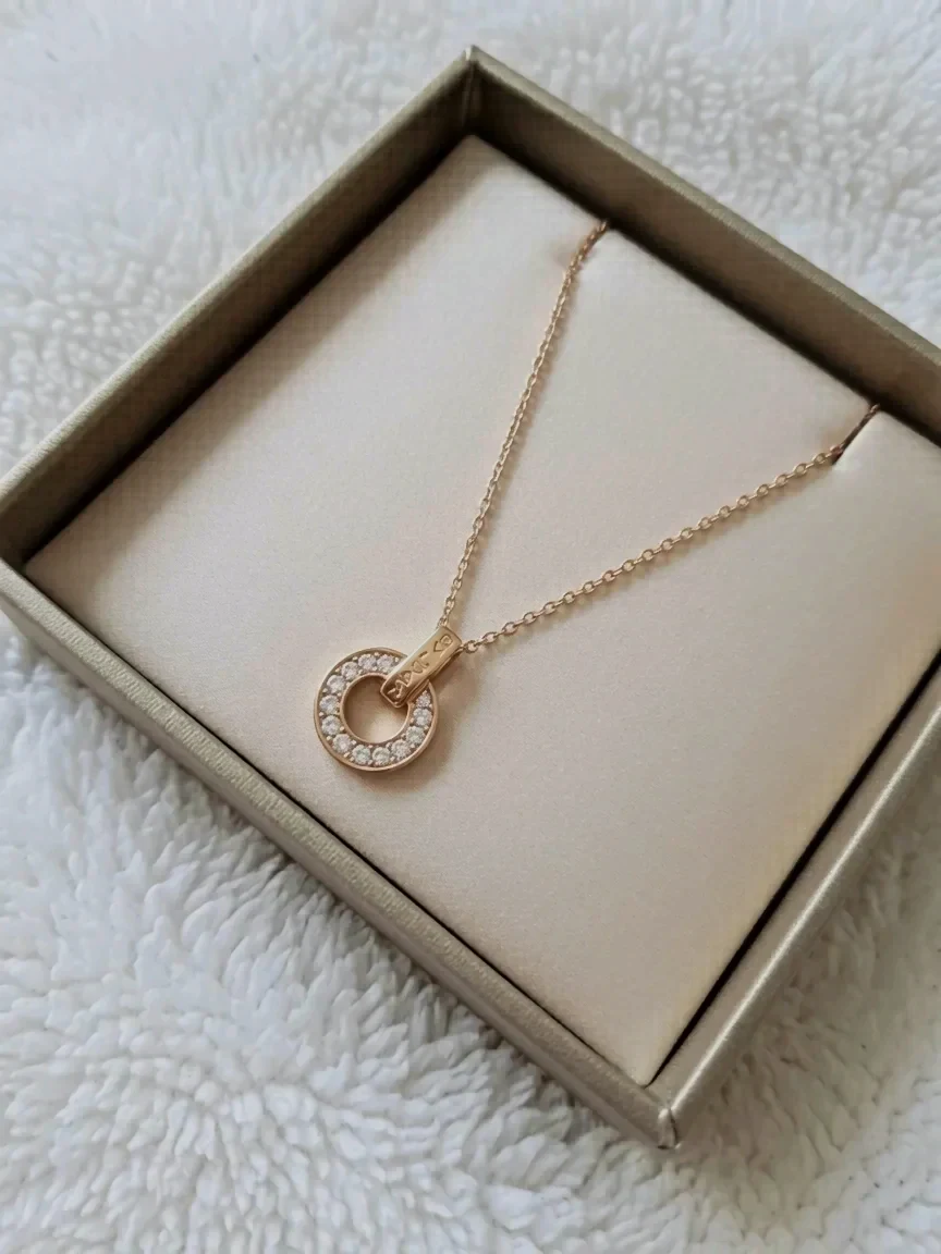 Collier pendentif cercle strass or rose