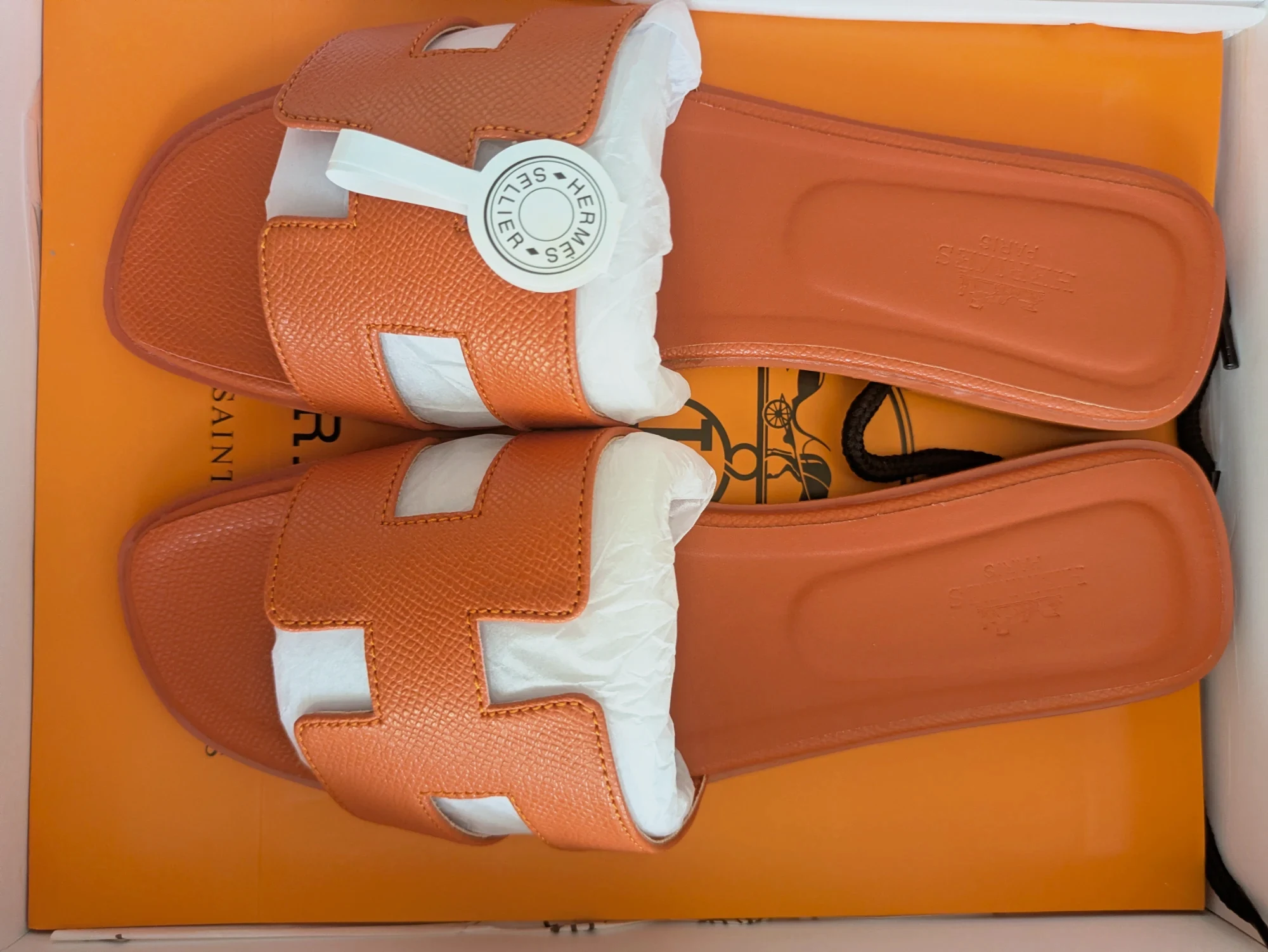 Mules Hermès orange à bride H