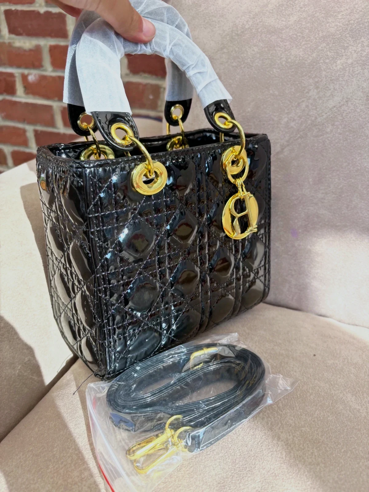 Sac Lady Dior noir vernis chaînes dorées