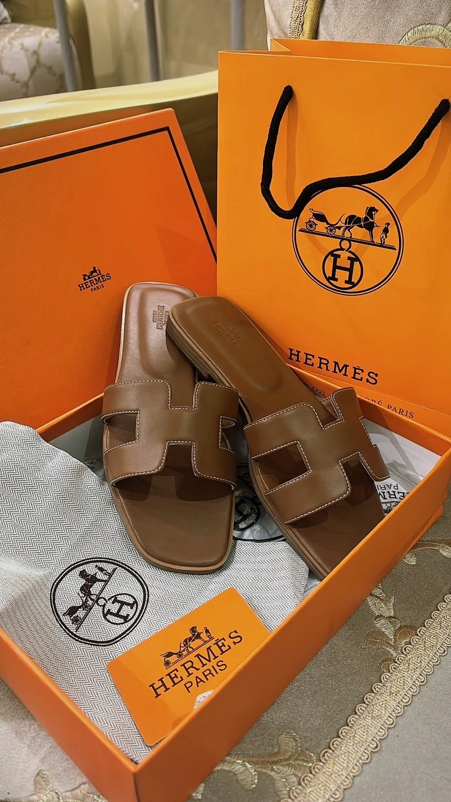 Mules Oran Hermès en cuir marron