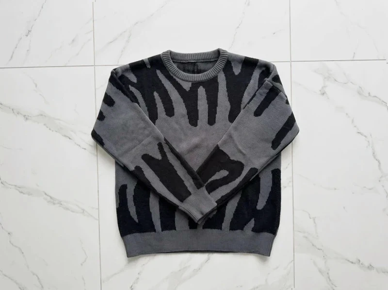 Pull noir et gris À motif graphique
