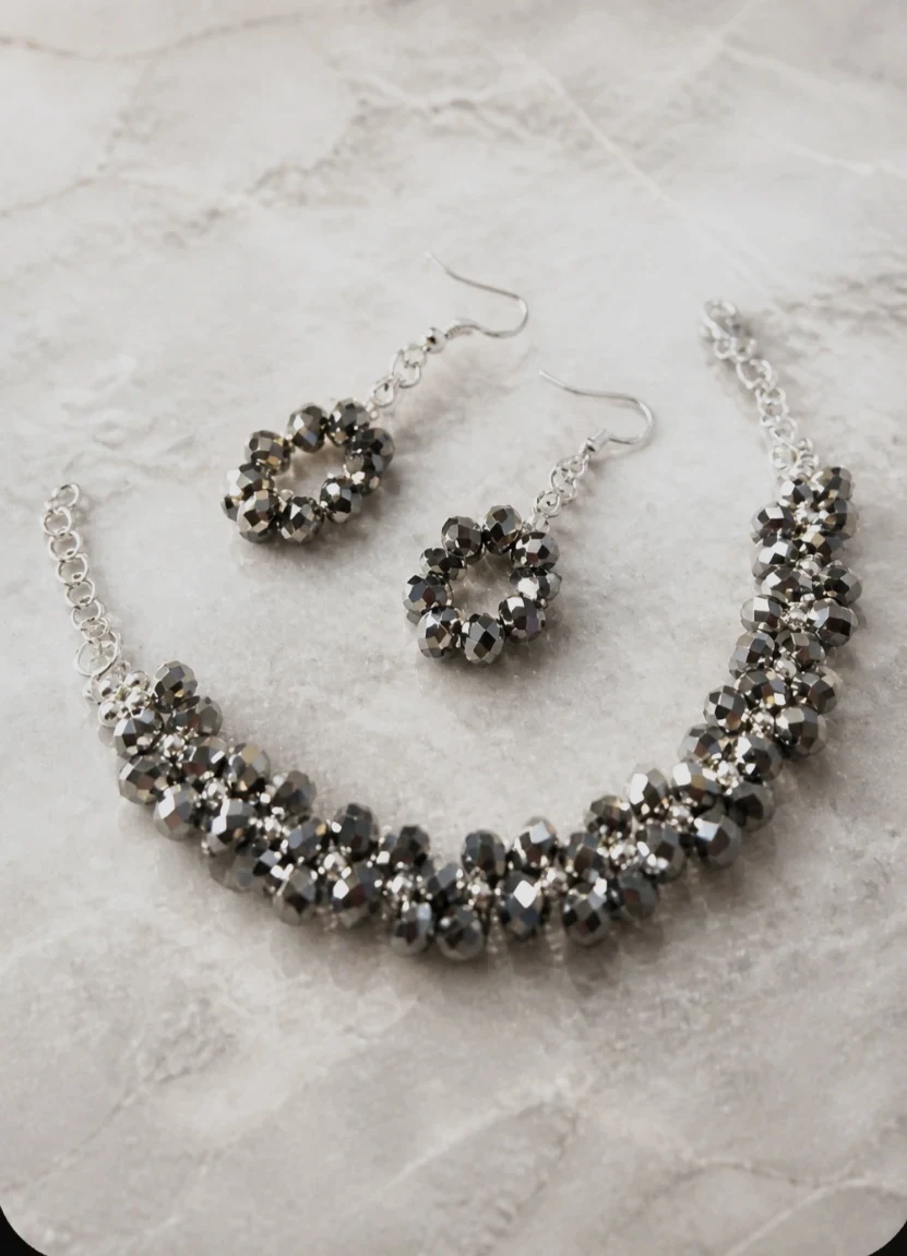 Parure de bijoux perles grises métallisées