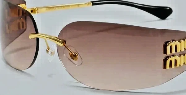 Lunettes de soleil doré vintage à verres dégradés miu
