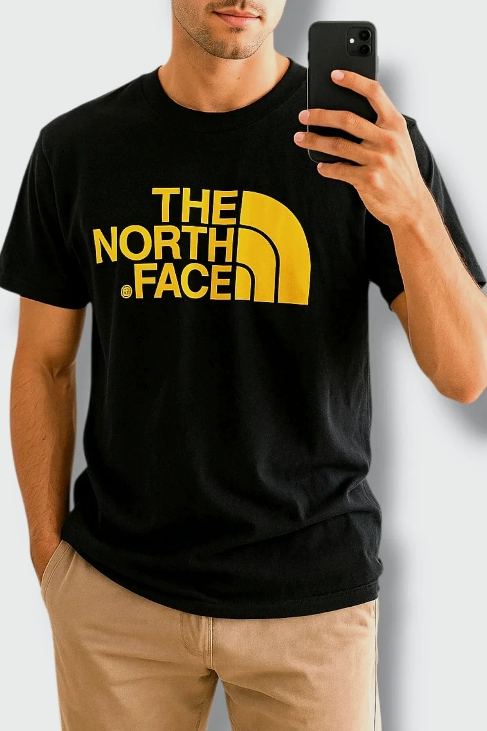 T-shirt noir imprimé The North Face jaune