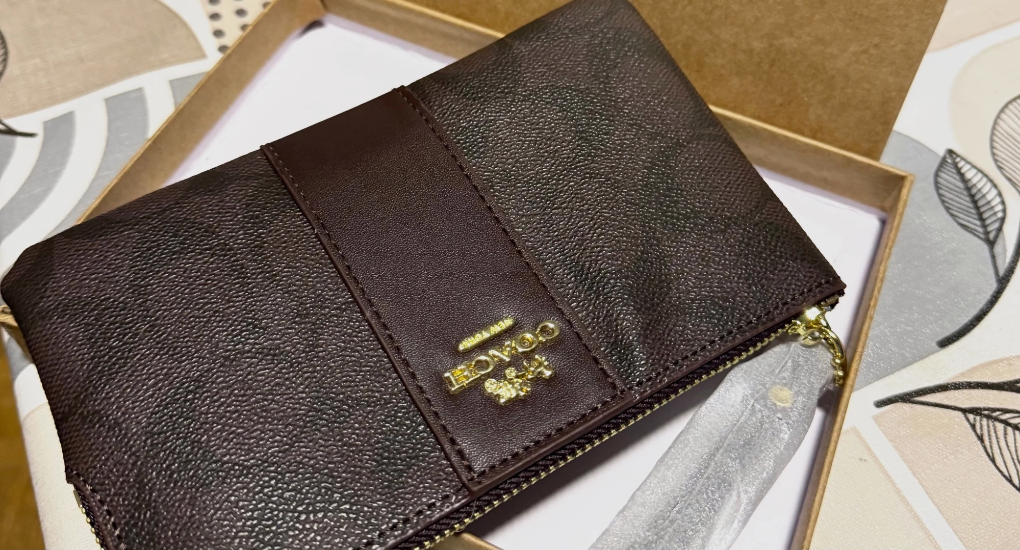 Pochette coach 