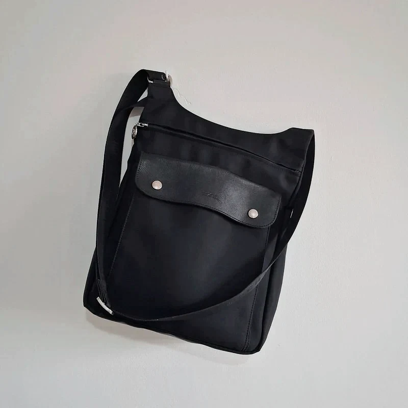Sac bandoulière Longchamp en toile noir