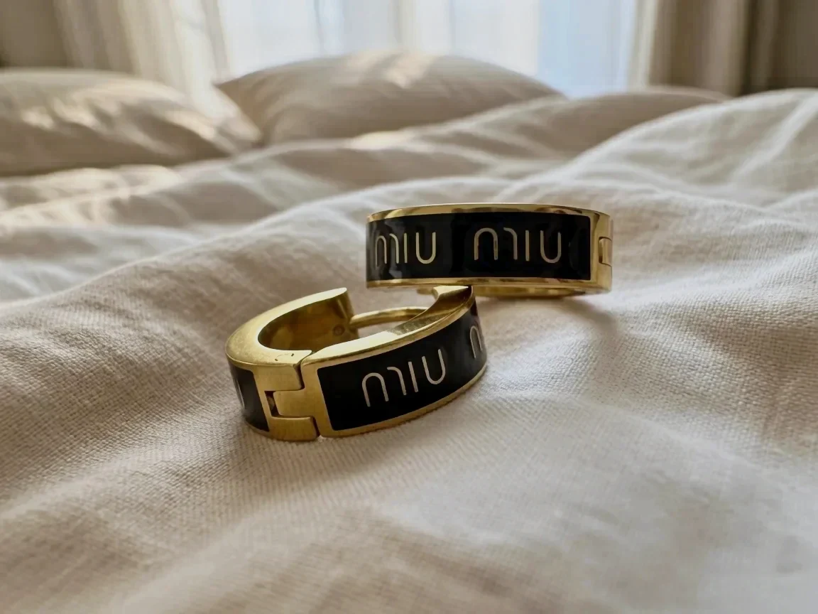Créoles Miu Miu dorées