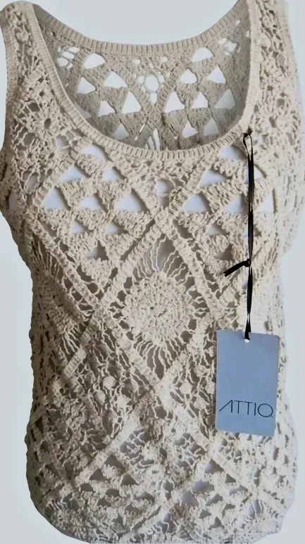 Attiro Blusa de encaje marfil sin mangas