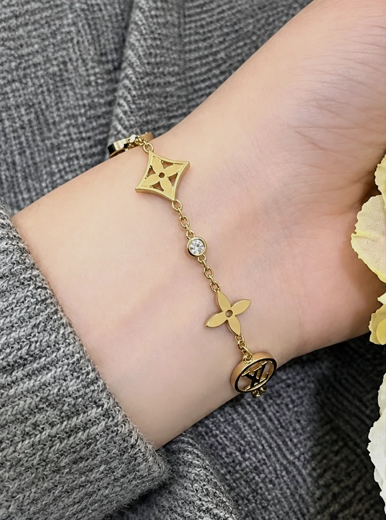 Bracelet fin doré Louis Vuitton fleurs monogramme