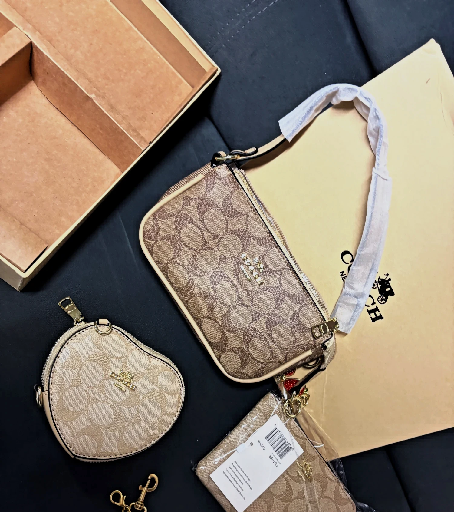 Ensemble de pochettes Coach beige