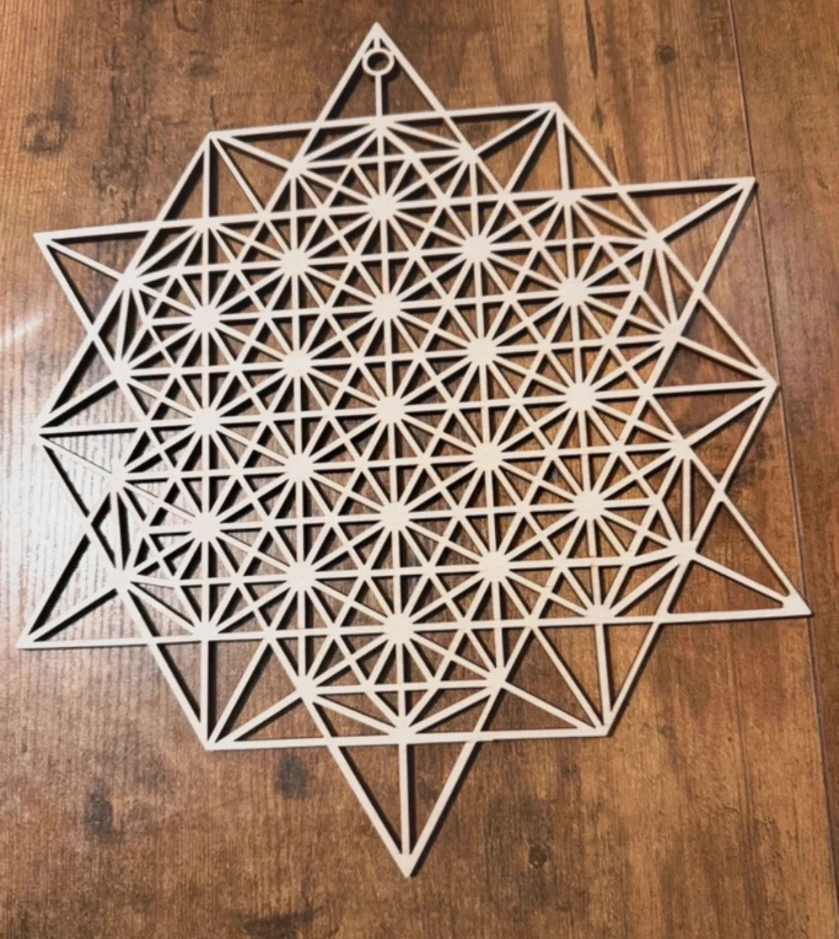Décoration murale bois ajouré, motif géométrique sacré, 30 cm – Fait Main