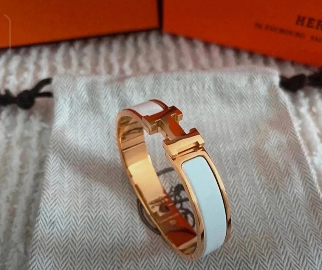 Bracelet Hermès Clic H émail blanc doré PM