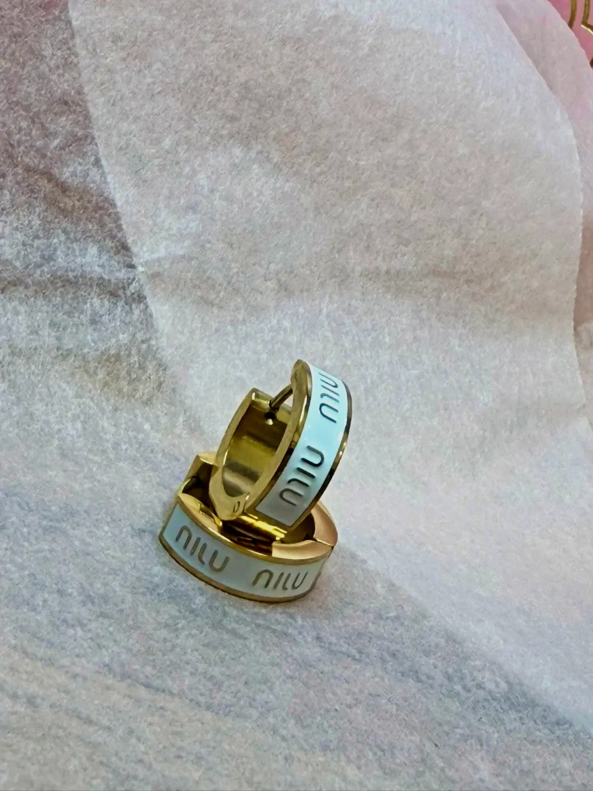 Boucles d'oreilles Miu Miu créoles dorées