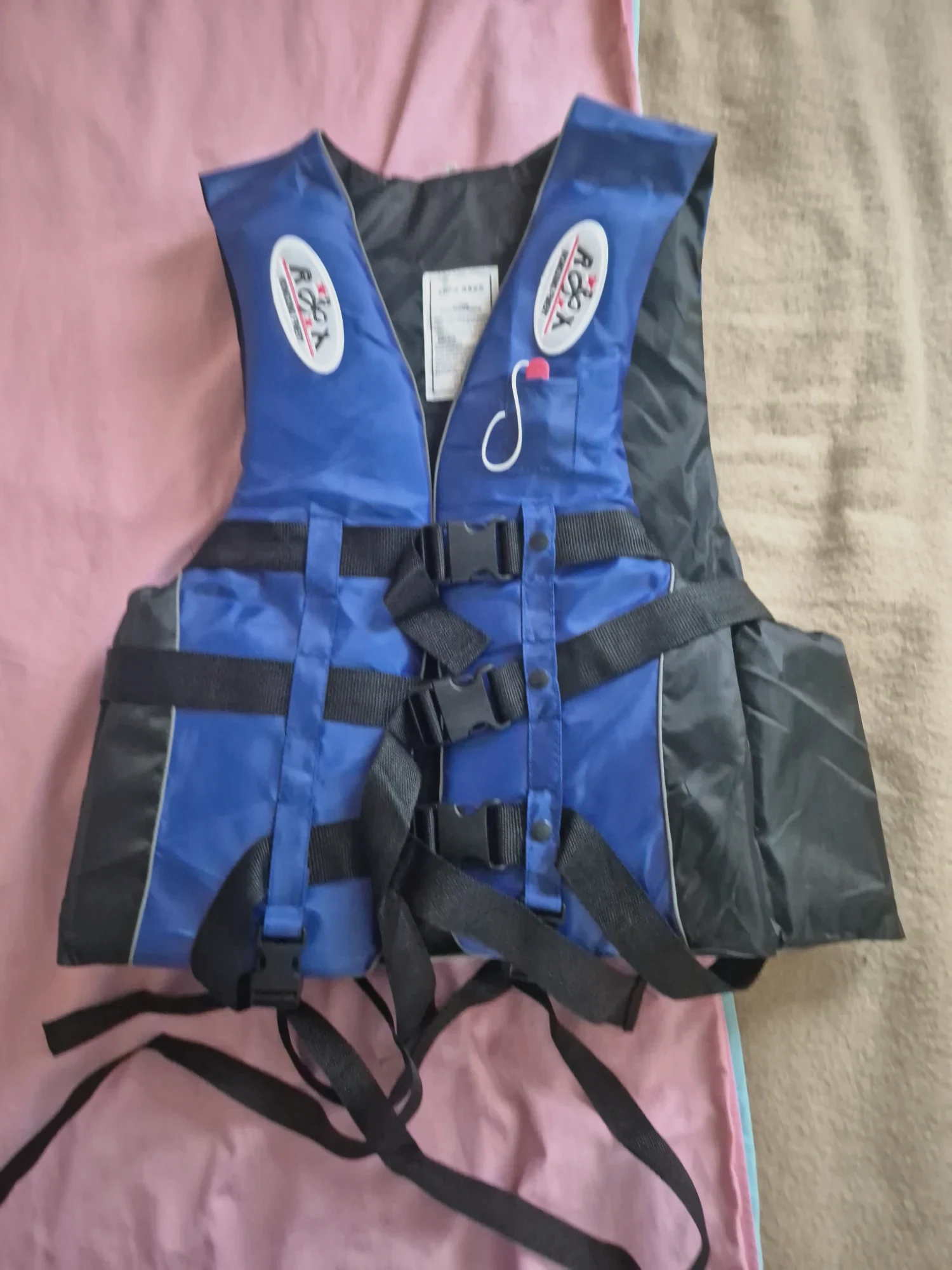 Gilet de sauvetage bleu et noir Roox