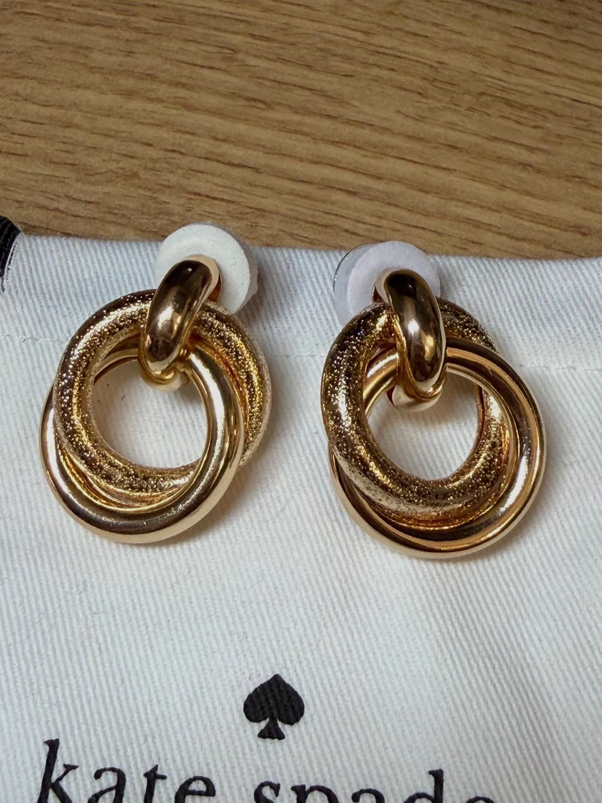 Boucles d'oreilles clips dorées Kate Spade
