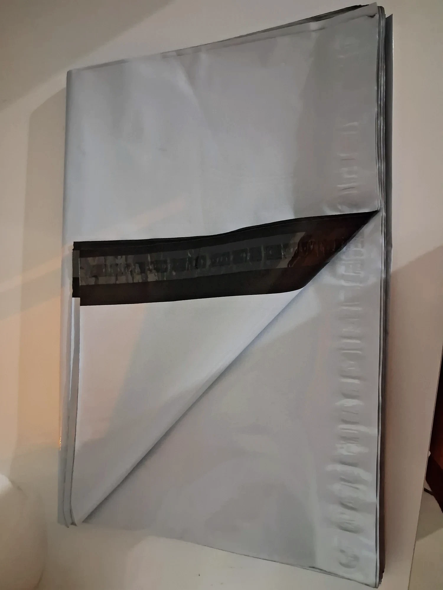 Lot de sachets d'expédition en plastique blanc