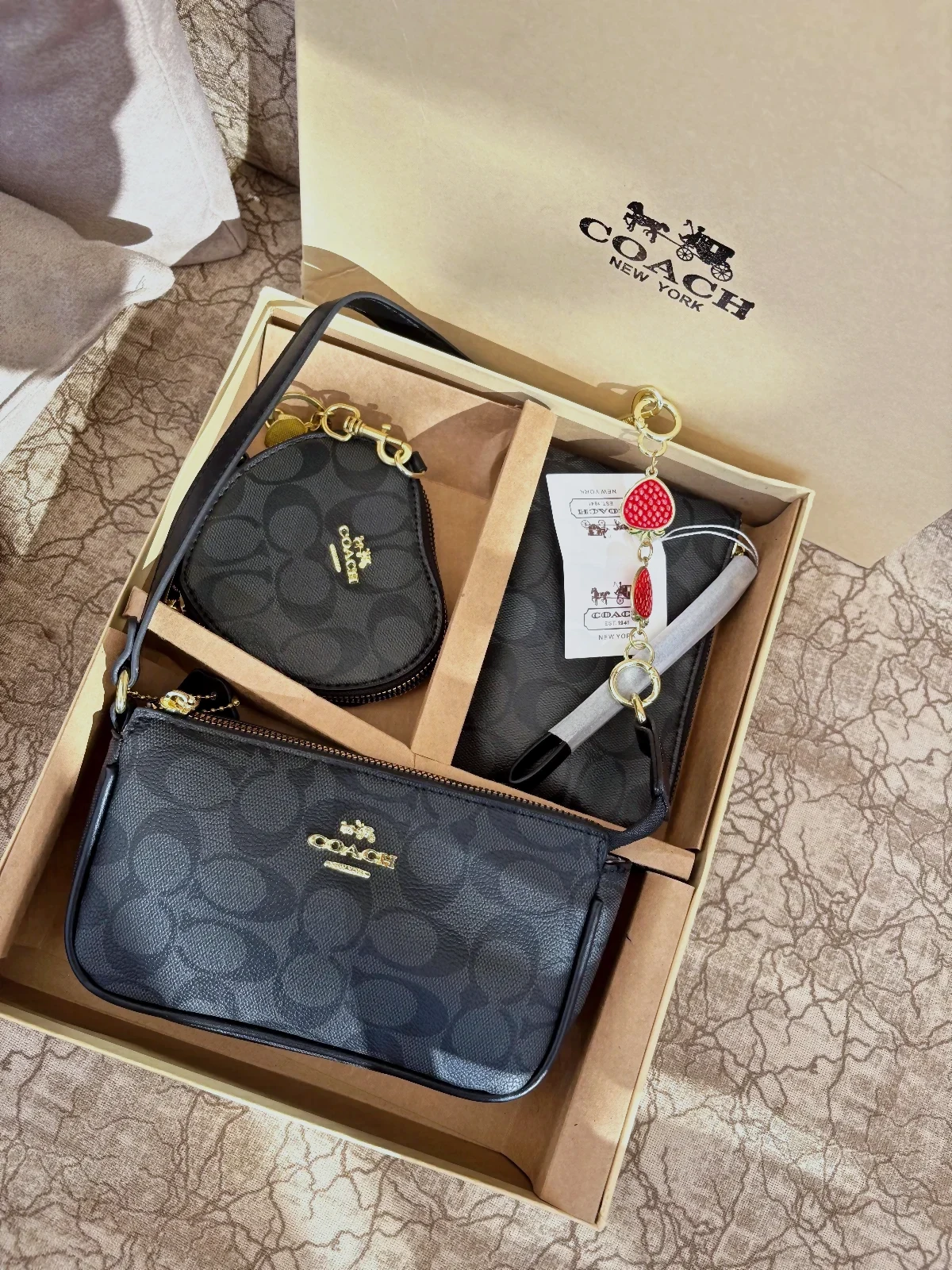 Coach ensemble porte-monnaie et pochette noirs