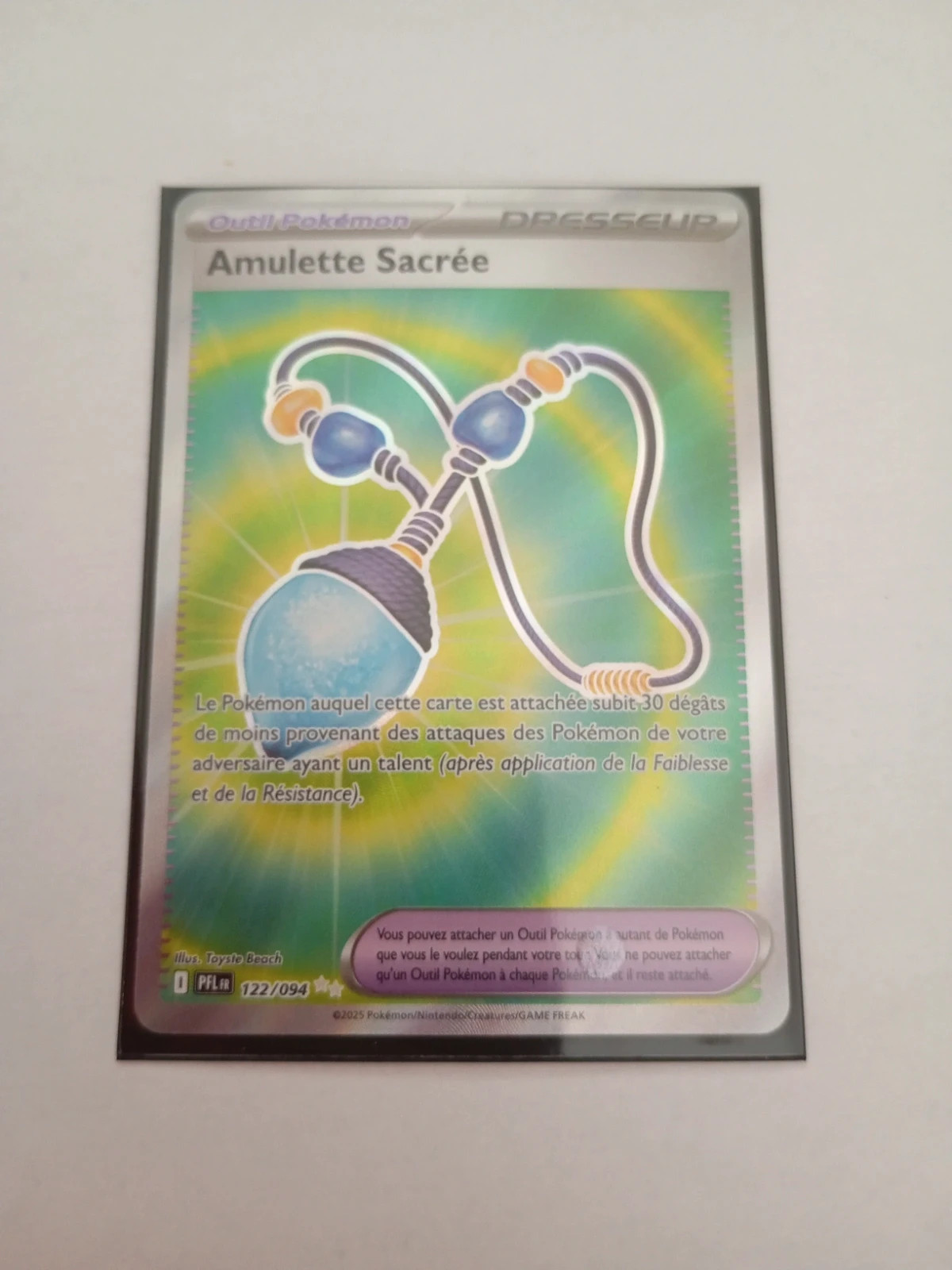 Carte Amulette Sacrée pokémon