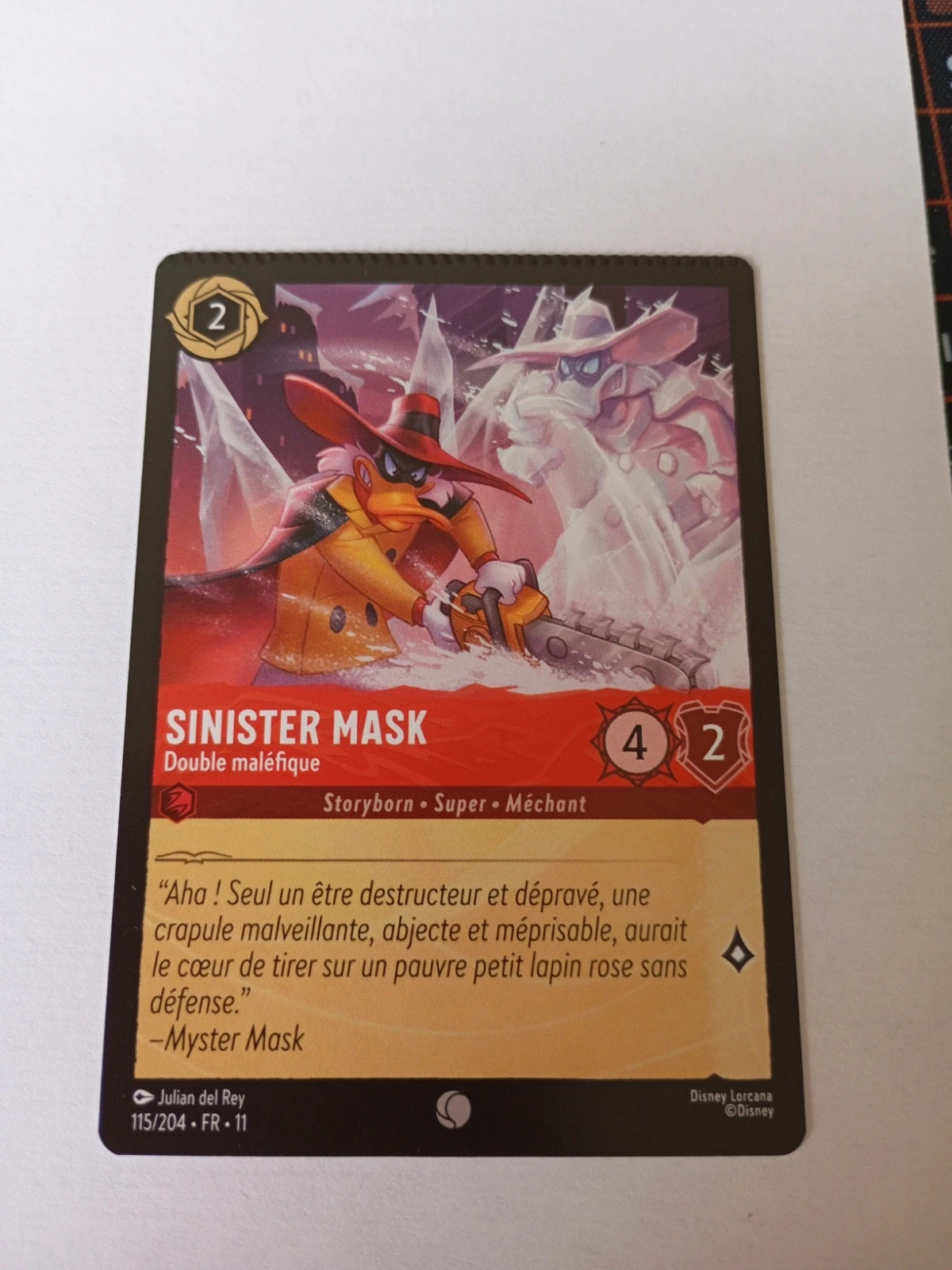 Carte mal découpée Sinister Lorcana