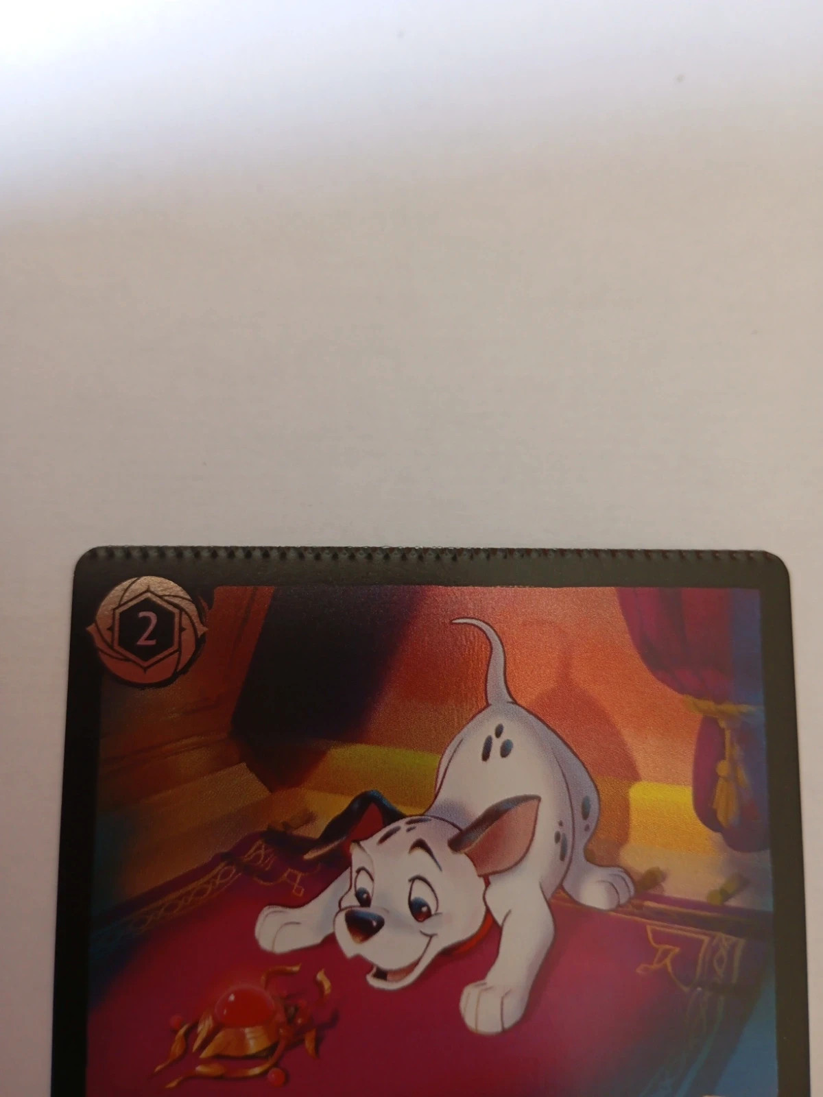 Carte foil mal découpée Dalmatien Lorcana – Disney 2