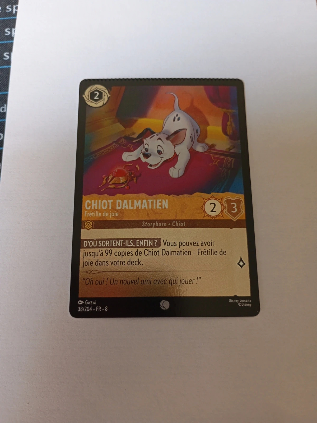 Carte foil mal découpée Dalmatien Lorcana