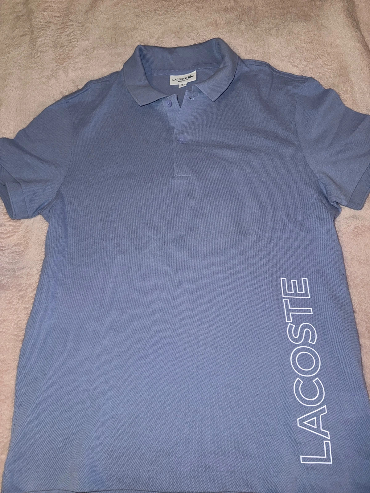 Polo Lacoste taille 4