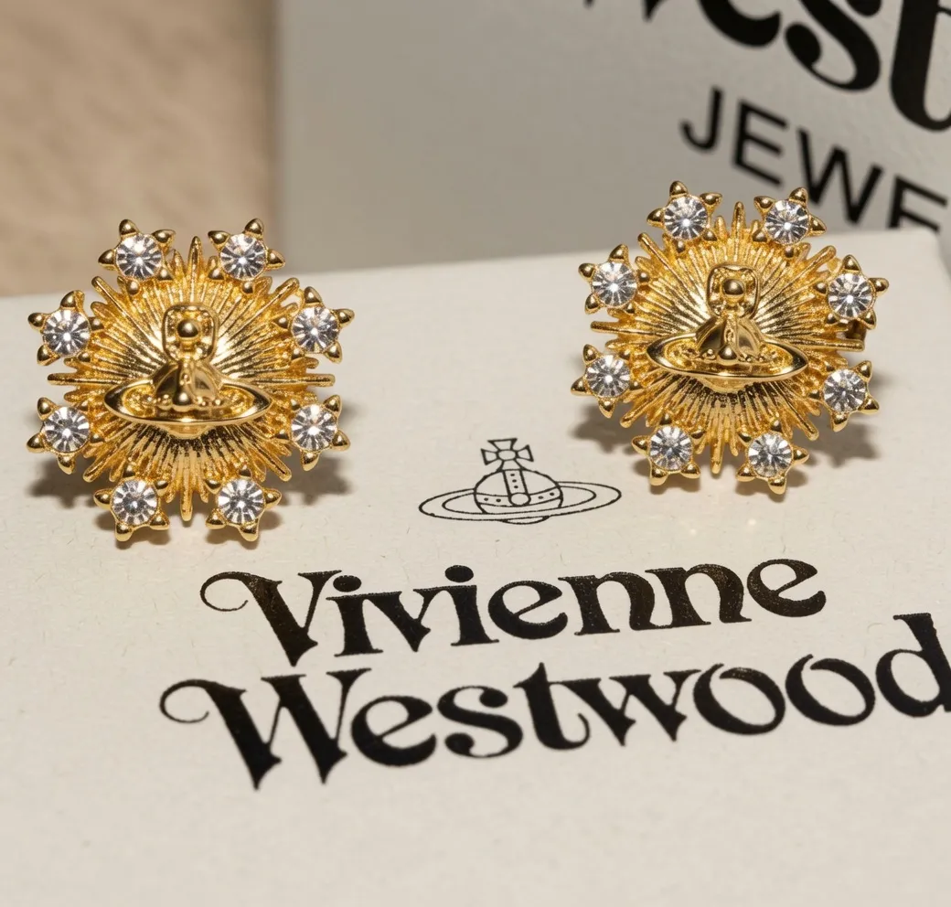 Boucles d'oreilles dorées Vivienne Westw 4
