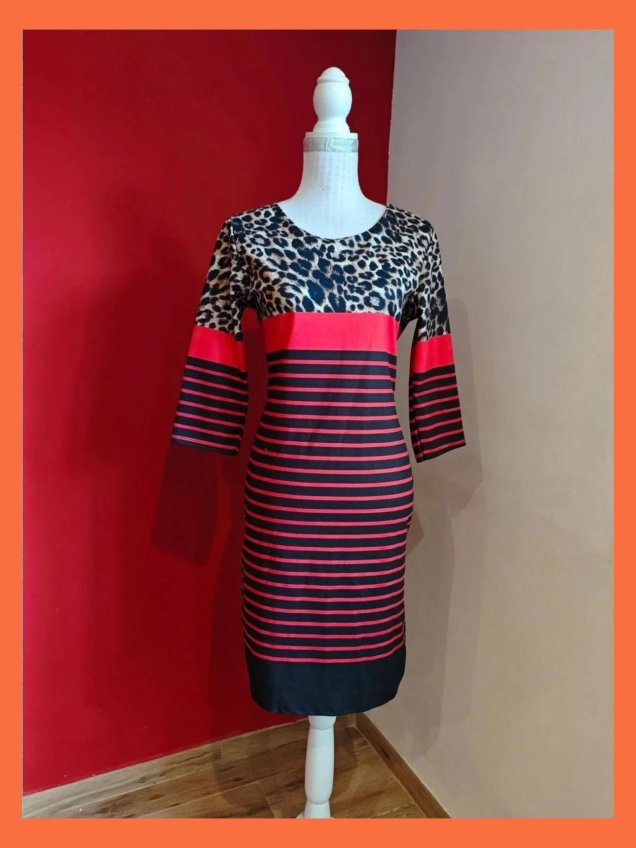 🌺 Vestido entallado con rayas rojo y negro y arriba estampado animal print