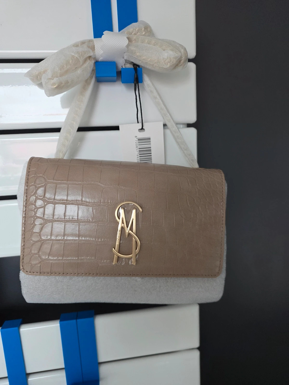 Sac pochette Steve Madden taupe effet crocodile