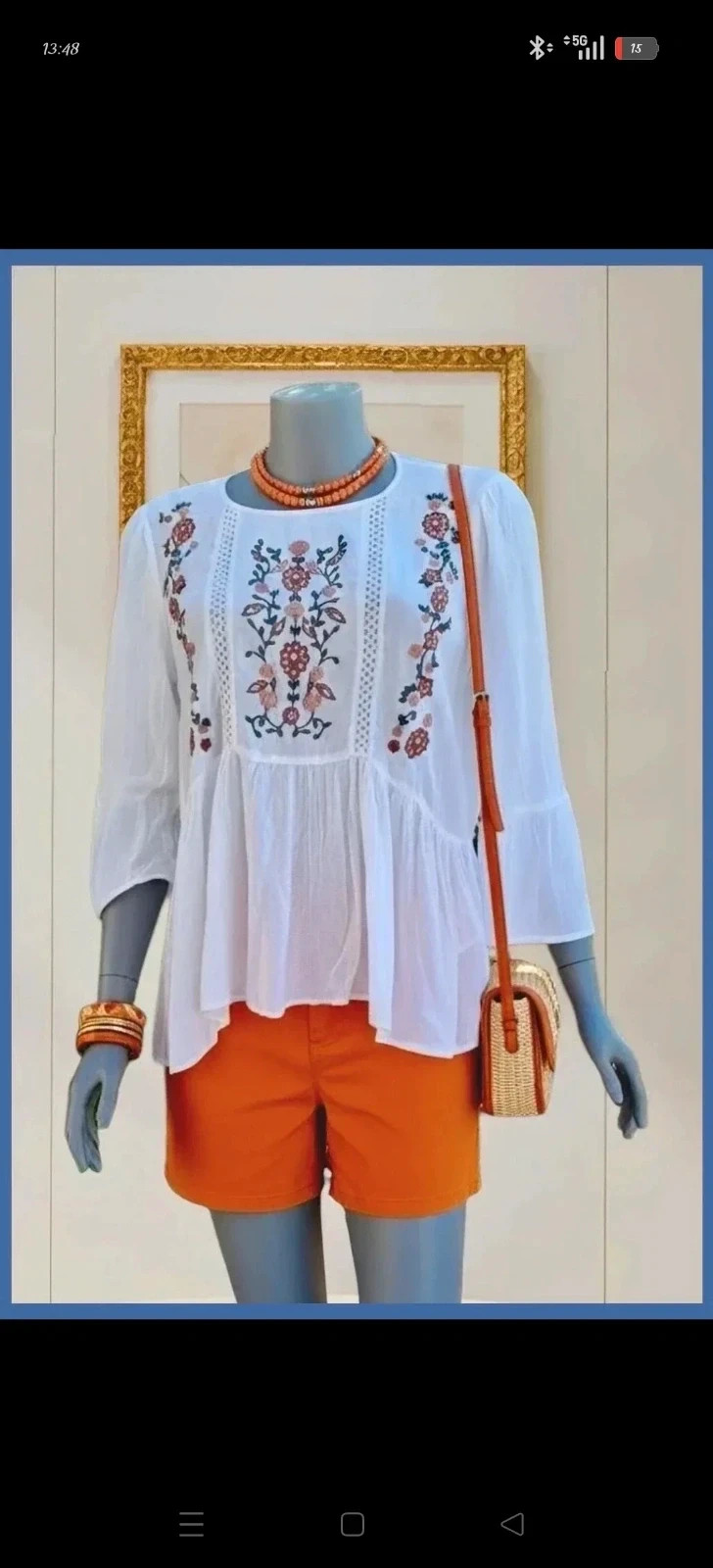 Blusa blanca con bordados florales 🌈