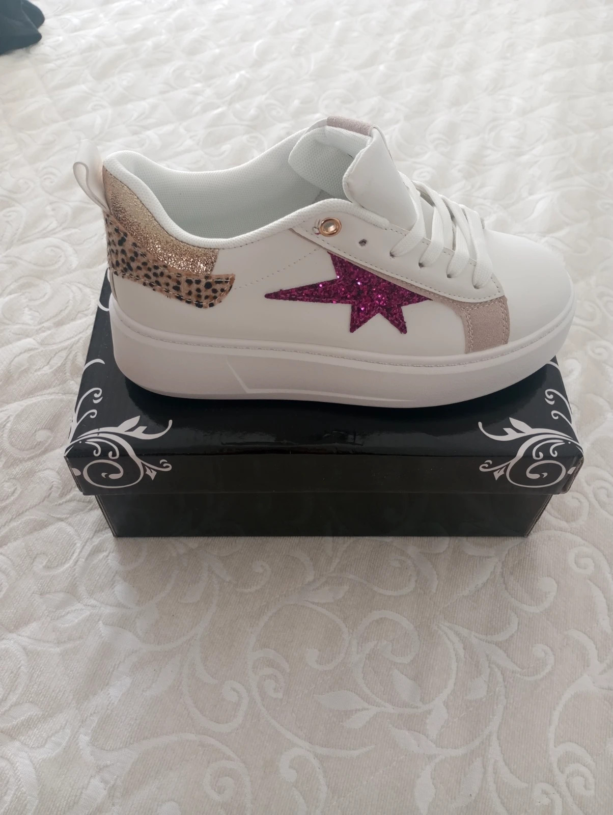 Zapatillas blancas estrella glitter y animal print - Talla40