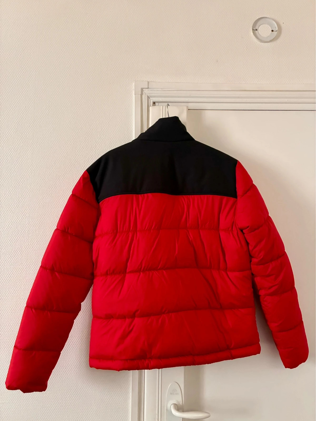 Doudoune Celio rouge et noir ( authentique )
