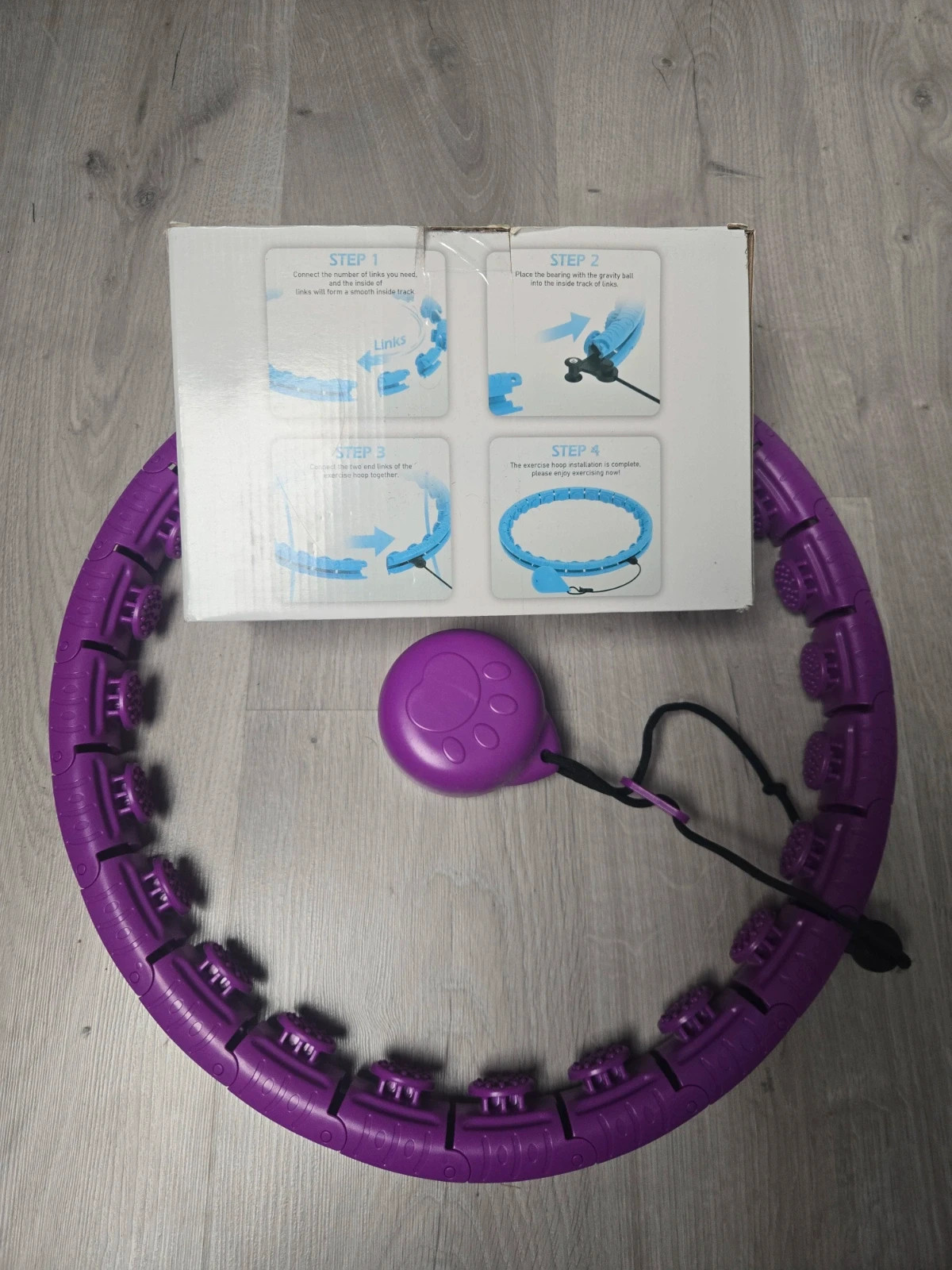 Cerceau de fitness violet reglable massant avec poids