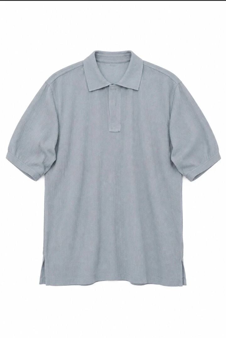 Polo Eléane bleu ciel L/XL, maille gaufrée, très bon état, dernière pièce 💙