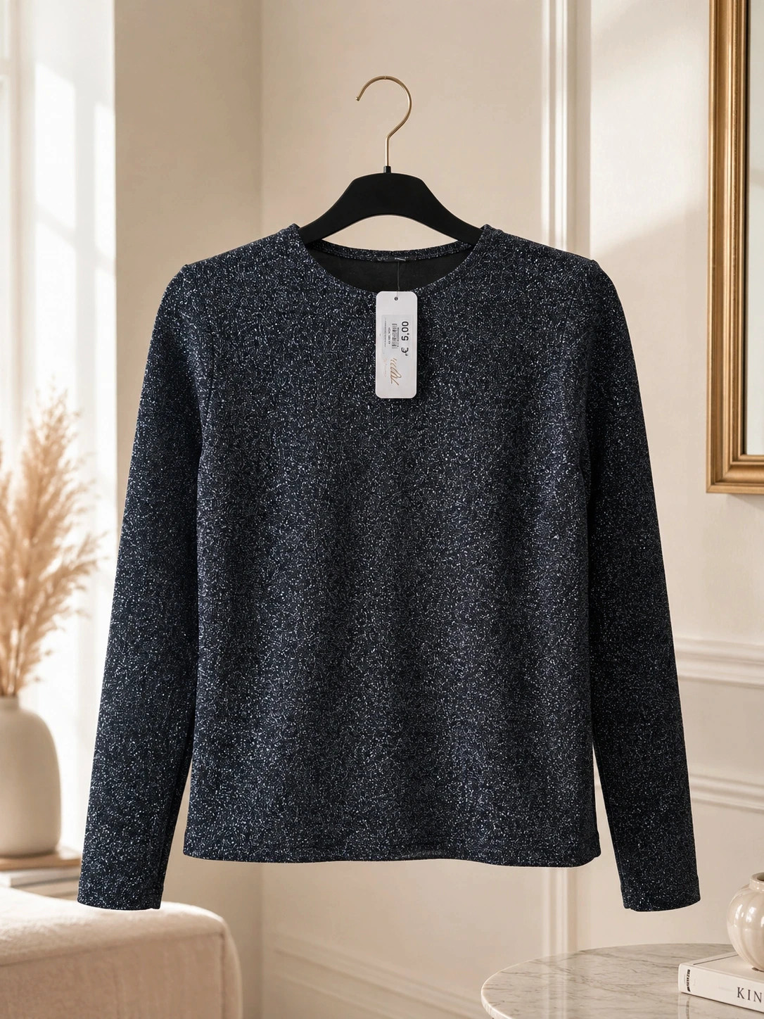 Top noir pailleté manches longues